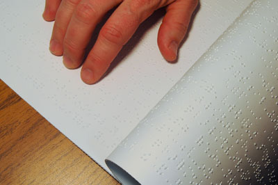 Person Reading Braille Person Reading Braille